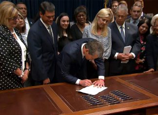 Georgia bans abortion after heartbeat is detected, recognizes fetus as natural person